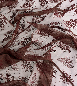 凸花青砖背景与合成纤维织物的现代融合