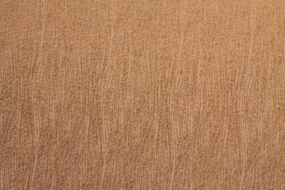 披着波浪的蓝绿色羊毛织物与合成纤维织物的对比与融合